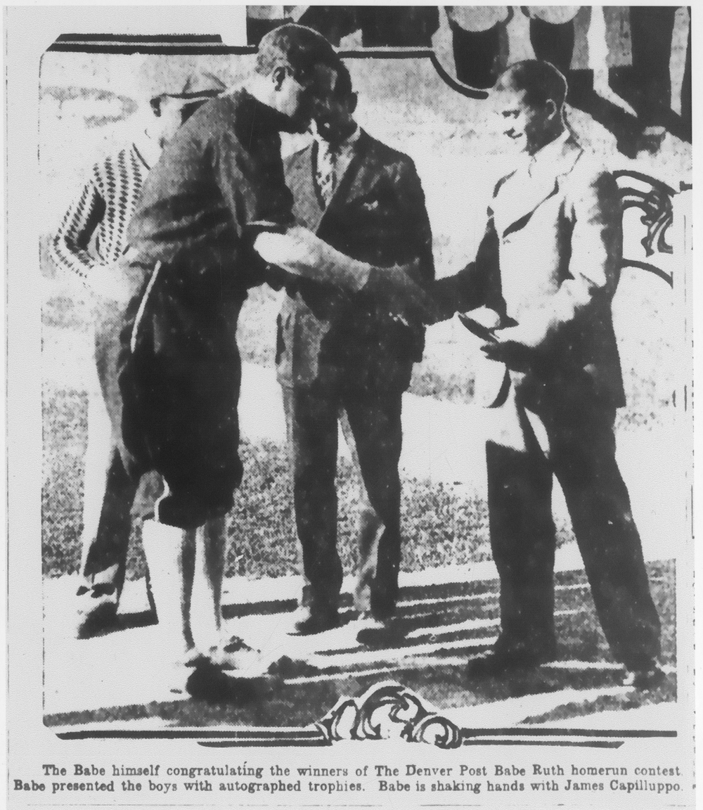 Babe Ruth shaking hands with James Capillupo