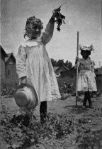 "Oh, look at my radishes!" A Kindergarten student demonstrates gardening success by holding up her harvest, 1902.