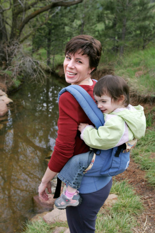 Mother with child in carrier