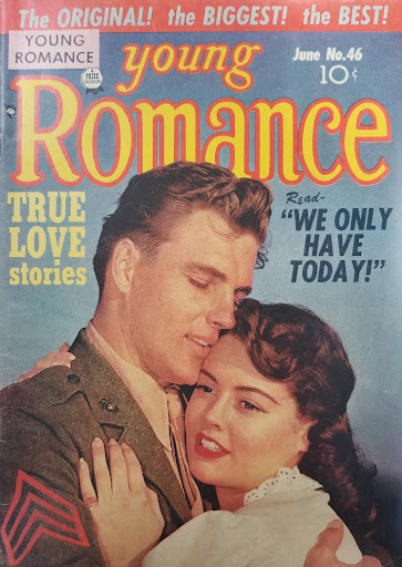 Photo of a comic book called Young Romance. The cover shows a young couple embracing. The tall young man wears a military jacket, and his eyes are closed as he leans his cheek against her head. She is shorter than him, and her right cheek touches the knot of his necktie. Her left hand rests against his right shoulder, and she is looking into the distance. The cover says, "TRUE LOVE stories" and "Read-We only have today!"