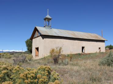 A photograph of Our Lady of Guadalupe Church in Medina Plaza