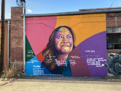 Mural of Nga Vương-Sandoval by Artist/Muralist Thomas Evans (I Am Detour), located on Champa between 23rd & 24th Streets in Denver, December 2021. Jason Hanson