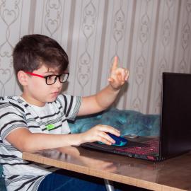 Online learner, hand raised